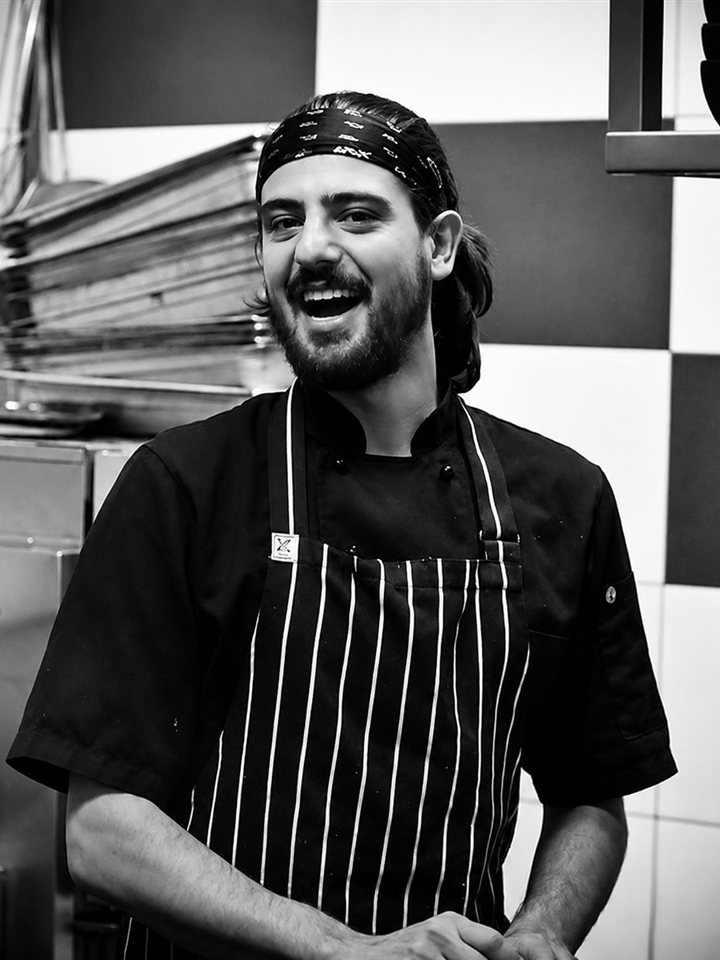 MASSA chef smiling in the kitchen